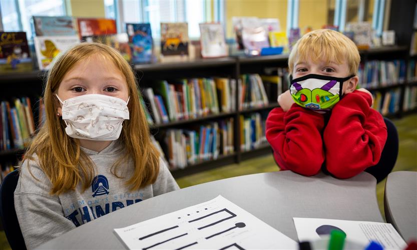 Students use robots in library